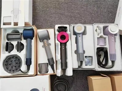 Qhov zoo tshaj plaws plaub hau tshuab rau Curly plaub hau